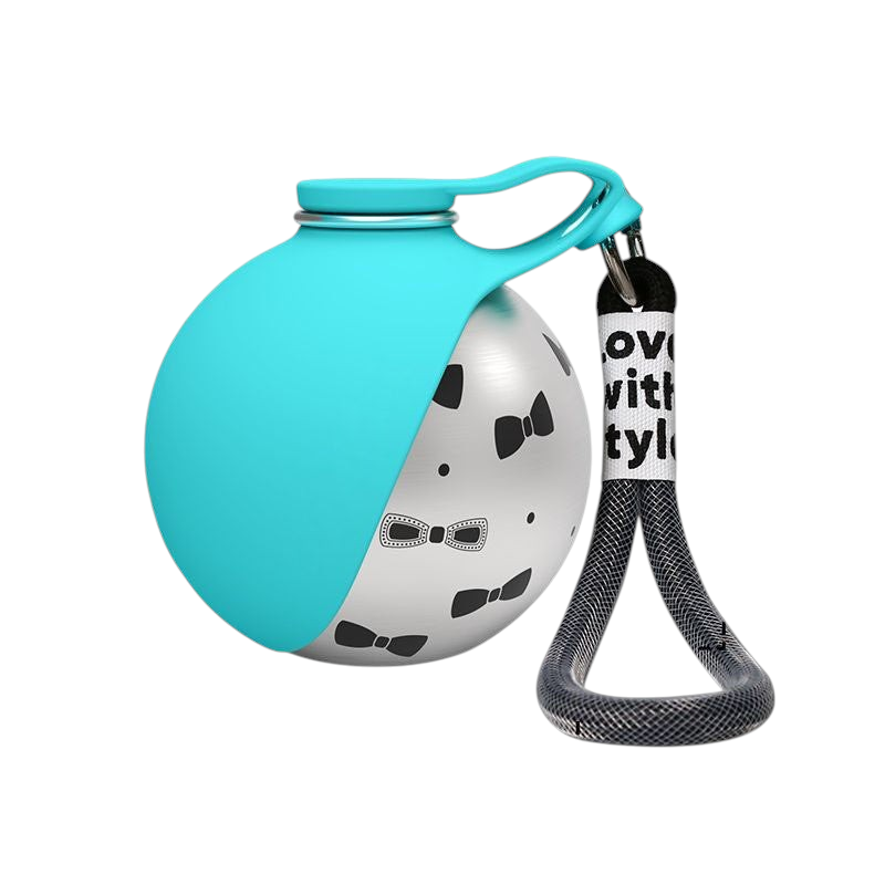 The Tailored Tail collapsible pet water bottle in Tiffany blue with a stainless steel body and bow tie pattern.